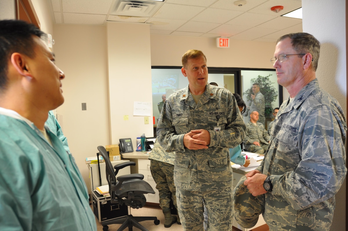 Colonel. James Dienst, right, Air Force Reserve Command Surgeon General, conducts a site visit at the 926th Aerospace Medical Squadron dental clinic here Jan. 9 as the unit prepares to make the transition to using electronic records. Dienst also visited the 726th Operations Group at Creech Air Force Base, Nev., on Jan. 8 to discuss the mental health teams created for Remotely Piloted Aircraft operators. (U.S. Air Force photo/Maj. Jessica D'Ambrosio)
