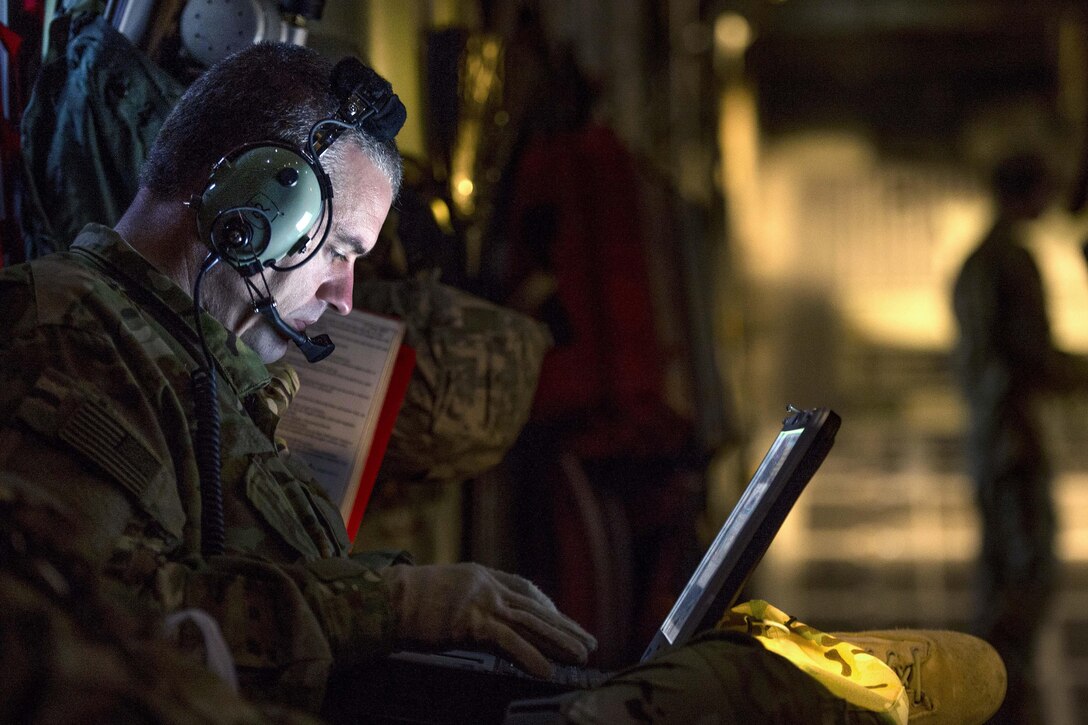 U.S. Air Force Capt. Kevin White logs a patient's information into the Electronic Health Record system in Southwest Asia to support Operation Inherent Resolve, Jan. 6, 2016. White is a nurse assigned to the 379th Expeditionary Aeromedical Evacuation Squadron. The electronic system gives aeromedical evacuation teams the ability update a patient's medical records as they receive treatment during the flight. U.S. Air Force photo by Tech. Sgt. Nathan Lipscomb