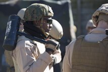 Sgt. Joseph Kharlange, an Explosive Ordinance Disposal technician with EOD Company, 8th Engineer Support Battalion, prepares for a simulated raid during a breaching course at Camp Lejeune, N.C., Jan. 14, 2016. The training is designed to incorporate different methods of entering a building, such as using a hammer to knock down the door in case the explosive fails, to prepare EOD for numerous scenarios they may encounter on a deployment. (U.S. Marine Corps photo by Lance Cpl. Samuel Guerra/Released)