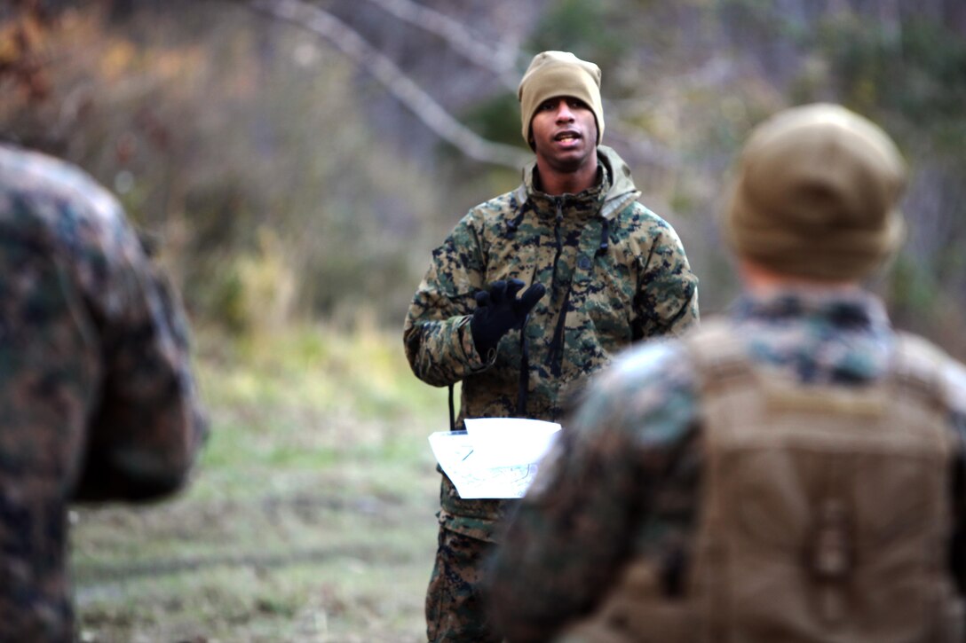Staff Sgt. Ronald E. Harrison delivers a safety brief before the start of a land navigation course at Marine Corps Air Station Cherry Point, N.C., Jan. 13, 2016. During the 19-point course, 20 Marines with Marine Wing Support Squadron 274’s Engineer Company, Heavy Equipment Platoon headed to the field to re-experience the basic land navigation process. The course was a refresher for most of the Marines, who have not used land navigation since Marine Combat Training. Harrison is an engineer equipment operator with MWSS-274. (U.S. Marine Corps photo by Pfc. Nicholas P. Baird/Released)