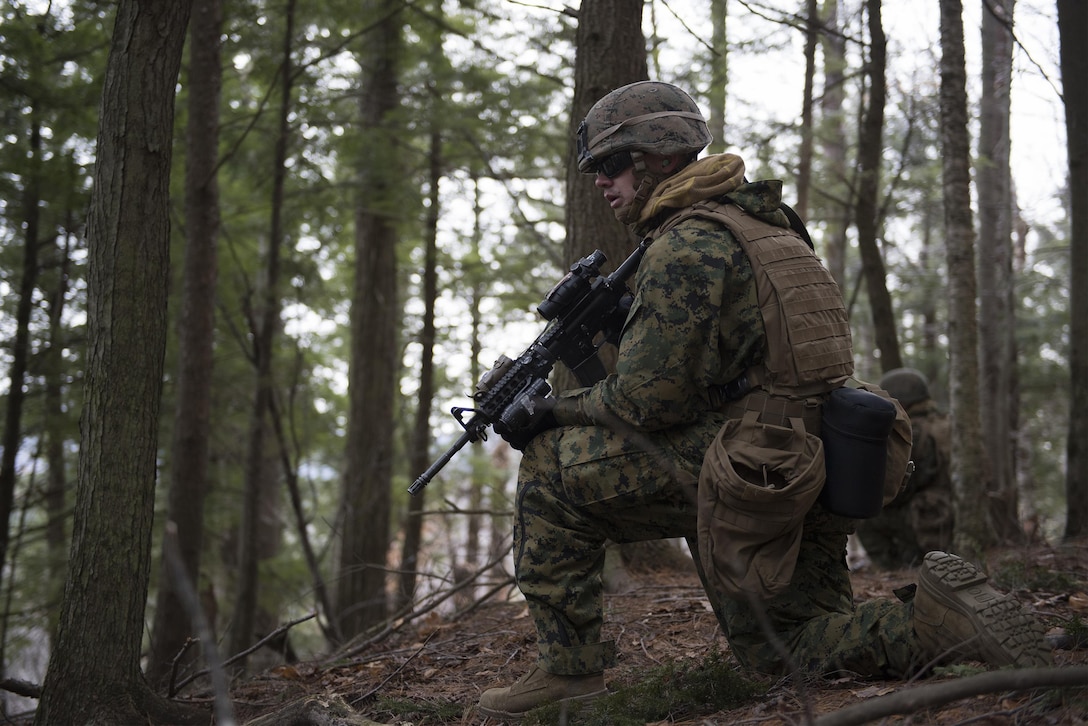 A Marine provides security on a patrol break on Camp Ethan Allen Training Site, Jericho, Vt., Jan. 12, 2016. Vermont Air National Guard photo by Tech. Sgt. Sarah Mattison