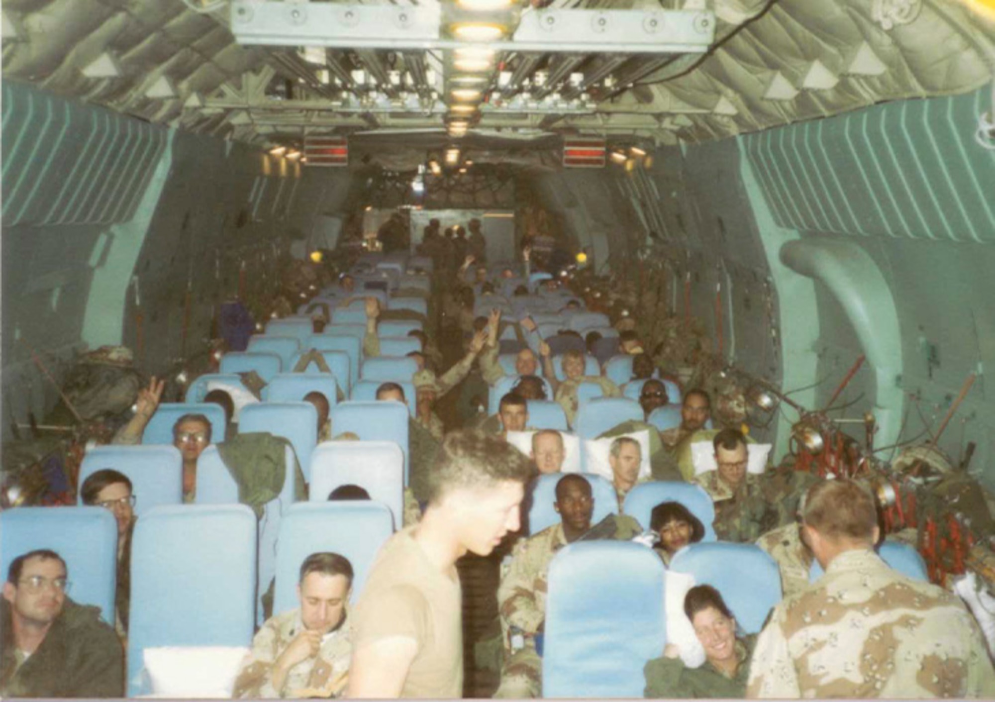 Members of Charleston Air Force Base prepare for departure to support Operation Desert Storm.