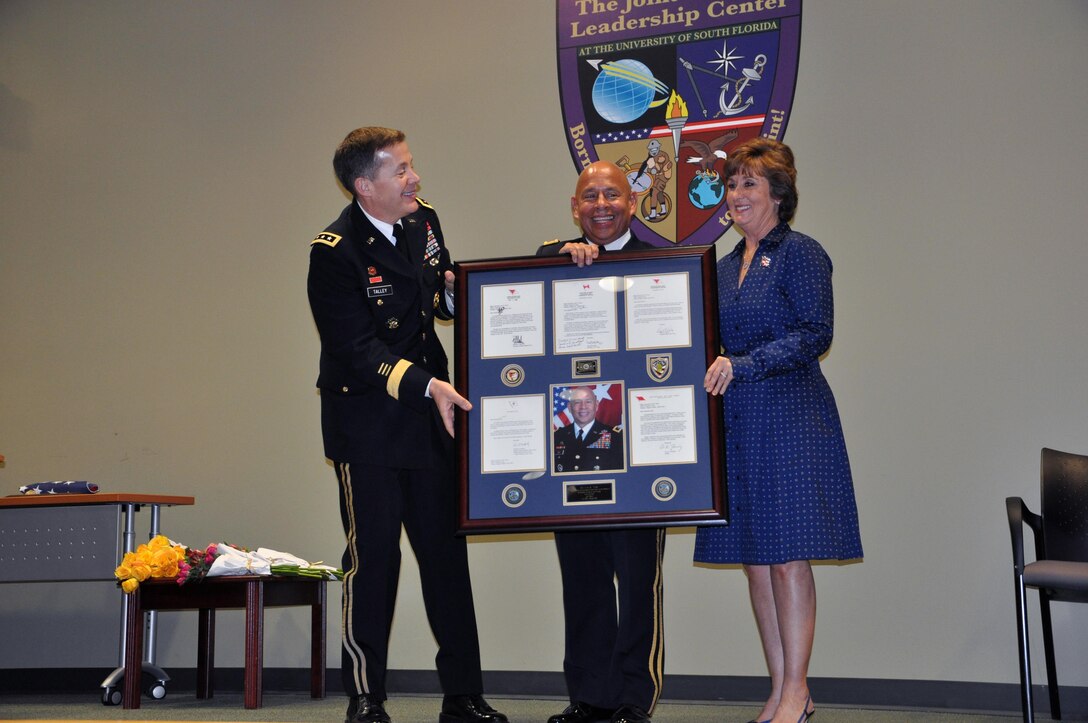 In a retirement ceremony held on Jan. 16, 2016, co-hosted by the U.S. Army Reserve and the University of South Florida, Lt. Gen. Jeffrey Talley, chief of the Army Reserve, recognized Maj. Gen. Luis Visot for his more than 37 years of service to the U.S. Army and the Nation. Maj. Gen. Visot and his wife, Dr. Cindy Visot, were both honored for their extensive time and contributions to their community, to their civilian occupations and to the Soldiers, civilians and families of the U.S. Army Reserve.