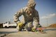 Airman 1st Class Brendan Kinser, 374th Civil Engineer Squadron pavements and equipment apprentice, performs a spall repair at Yokota Air Base, Japan, Jan. 13, 2016. Aptly named ‘Dirt Boys’, 374th CES pavement and equipment Airmen perform spall repairs as part of their preventative maintenance practices to ensure Yoktoa’s airfield is free of cracks and tears. (U.S. Air Force photo by Airman 1st Class Delano Scott/Released) 