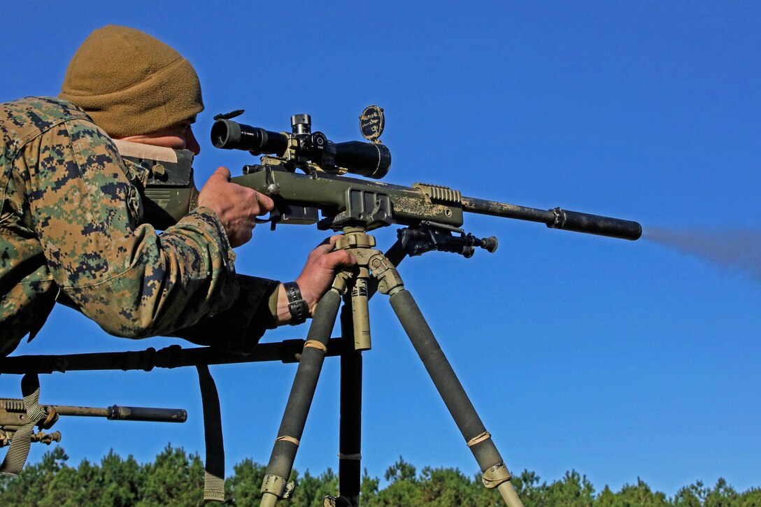A Marine fires on a target with the M40A5 sniper rifle at Marine Corps Base Camp Lejeune, N.C., Jan. 12, 2016. The student is participating in the 2nd Marine Division Combat Skills Center Pre-Scout Sniper course. Participants learn skills such as stalking, camouflage, land navigation and marksmanship. Marine Corps photo by Cpl. Paul S. Martinez