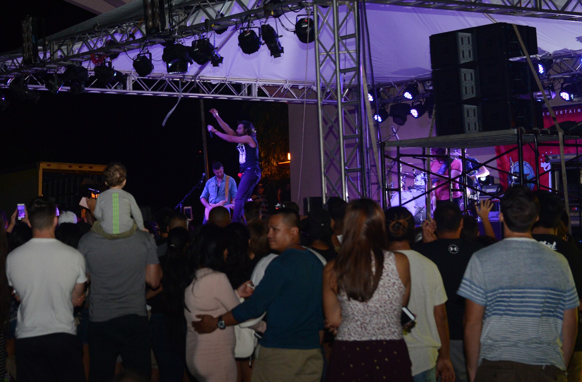 The Canadian reggae fusion band Magic! performs for service members and their families Jan. 14, 2016, at Andersen Air Force Base, Guam. The free event was hosted by the Department of Defense’s Armed Forces Entertainment and drew a crowd of 2,000 people. (U.S. Air Force photo/Airman 1st Class Arielle Vasquez)