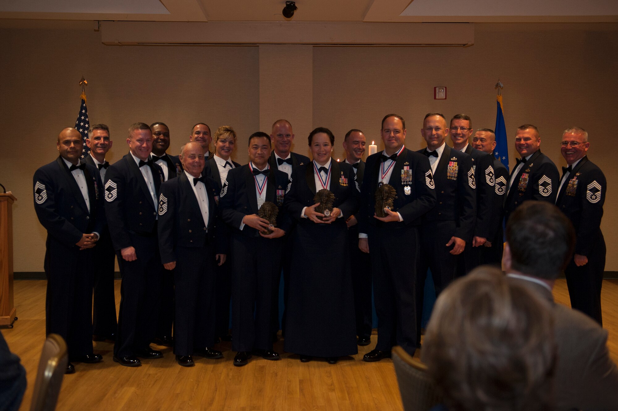 Members of the Moody Chief’s group poses for a photo with the newest chief master sergeant selects during the Chief Recognition Ceremony, Jan. 16, 2016, at Moody Air Force Base, Ga. The evening consisted of a formal dinner and a ceremony in which the new chief master sergeant selects were recognized. (U.S. Air Force photo by Airman 1st Class Kathleen D. Bryant/Released)


