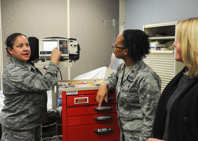 Capt. Marisa Hester, 99th Medical Group intensive care unit student mentoring and retention team nurse cadre, teaches how to properly use a device while administering care to patients Jan. 11 at Nellis Air Force Base Nev. For her actions in the Air Force and in the civilian sector, Hester was awarded the southern Nevada nurse of the year. (U.S. Air Force photo by Senior Airman Jake Carter)