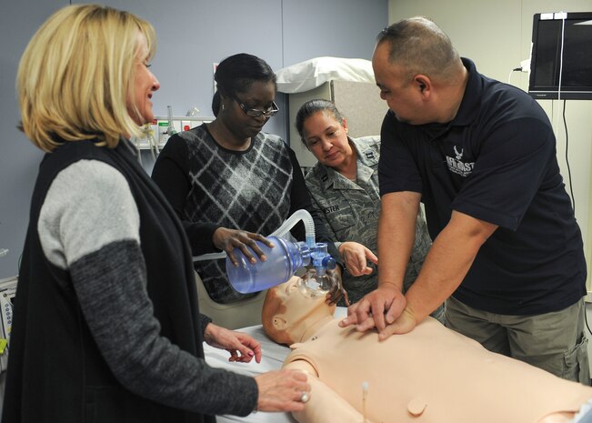 Capt. Marisa Hester, 99th Medical Group intensive care unit student mentoring and retention team nurse cadre administers training to students Jan. 11 at Nellis Air Force Base, Nev. As a cadre, Hester trains students in how to efficiently provide care to their respective patients. (U.S. Air Force photo by Senior Airman Jake Carter)