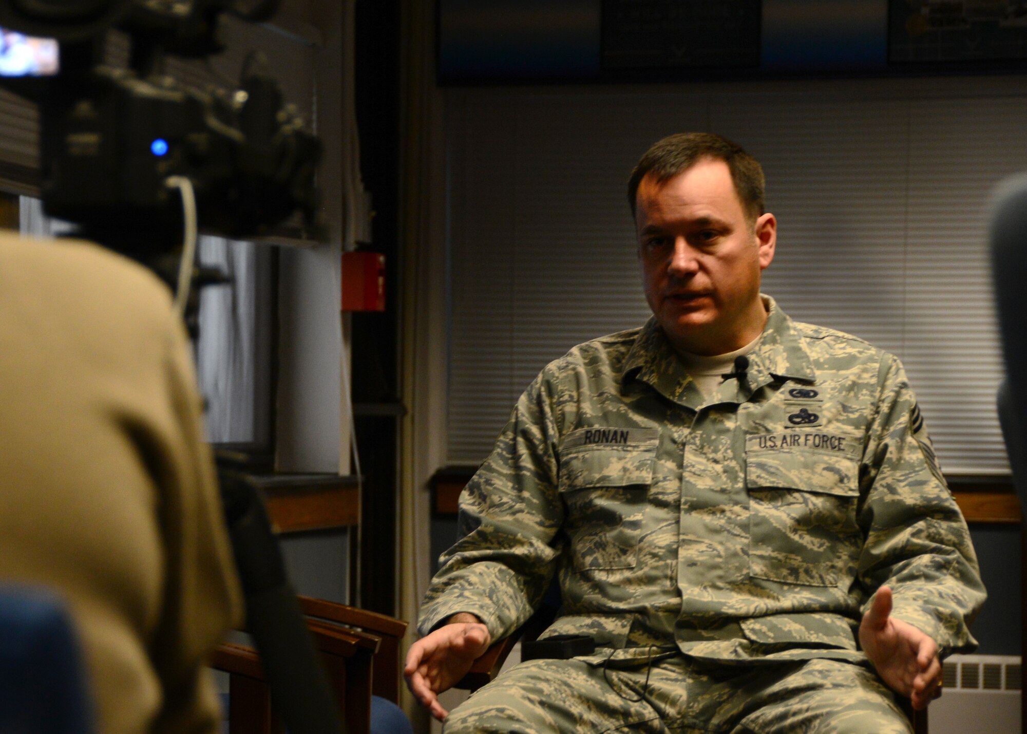 Chief Master Sgt. Clint Ronan is interviewed by Erie Community College at Niagara Falls Air Reserve Station, January 9, 2016. Ronan was providing this interview as a recipient of  ECC's 2016 Distinguished Alumni Award. (U.S. Air Force photo by Staff Sgt. Richard Mekkri)