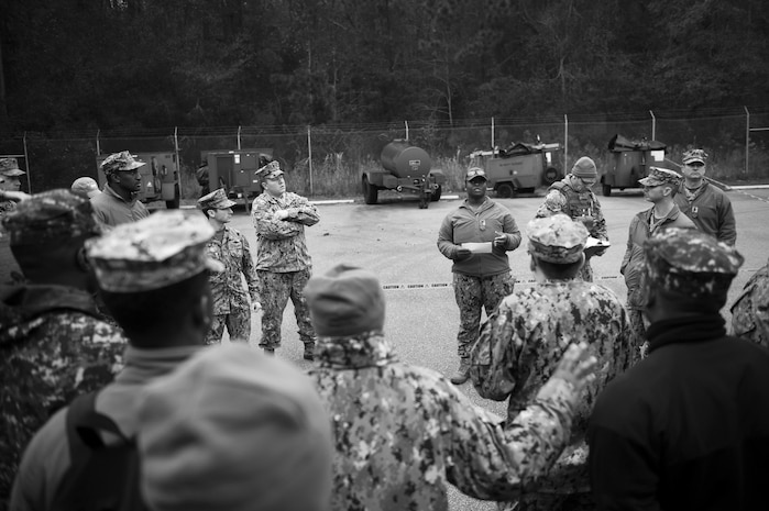 Participants of weapons sustainment training ask questions during the safety brief Jan. 9, 2016, at Joint Base Charleston, S.C. The two day, semi-annual training event was hosted by the Coastal Riverine Squadron 10 Bravo Company, a Navy Reserve team stationed at Joint Base Charleston – Weapons Station. The participants were required to show proficiency and familiarization with the M240B machine gun. (U.S Air Force Photo/Staff Sgt. Jared Trimarchi)
 
