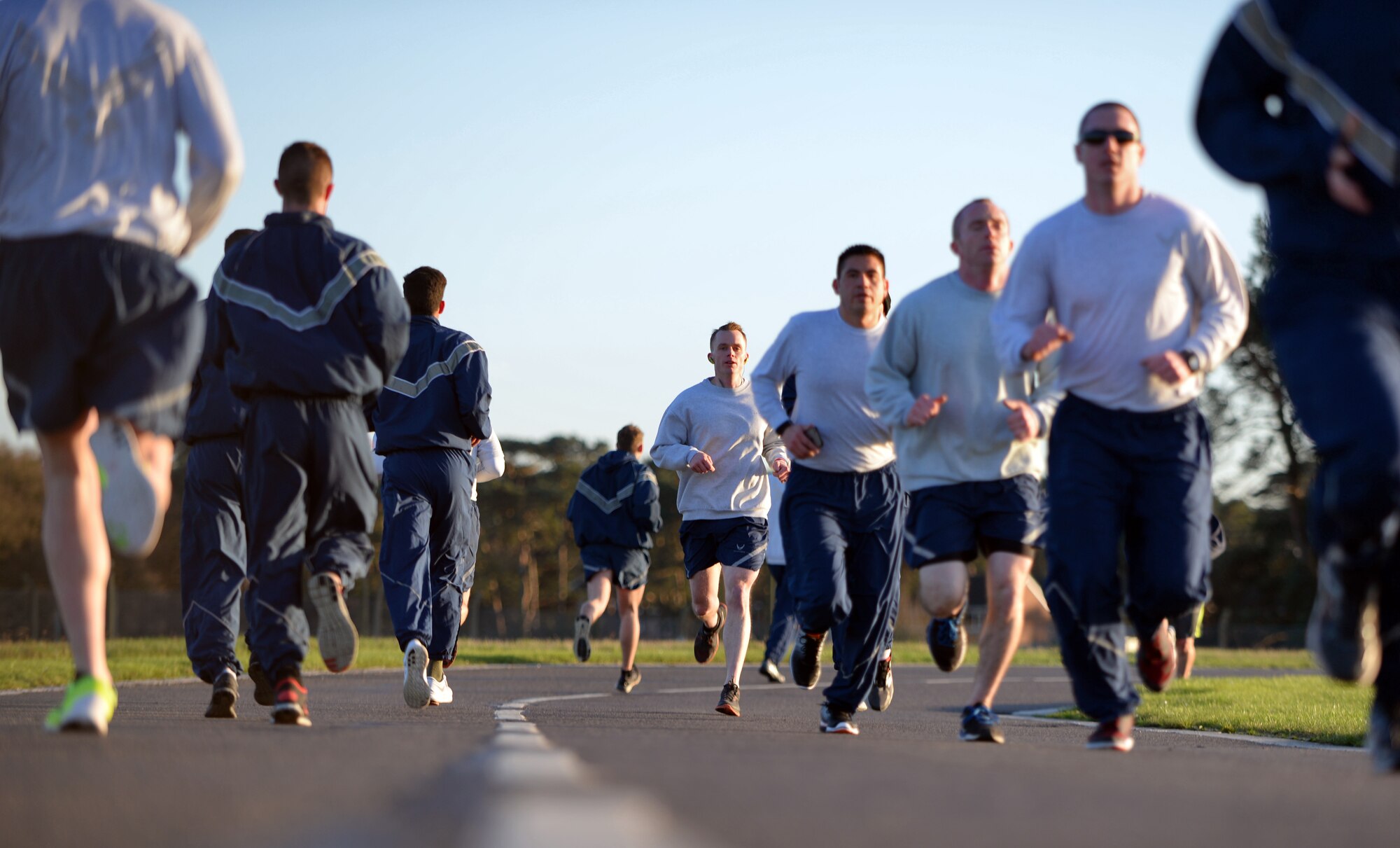 U.S. Air Force Airmen from the 100th Air Refueling Wing run the monthly 5k around the flightline Jan. 15, 2016, on RAF Mildenhall, England. January’s run was in honor of Martin Luther King Jr. Day. (U.S. Air Force photo by Senior Airman Christine Halan/Released)