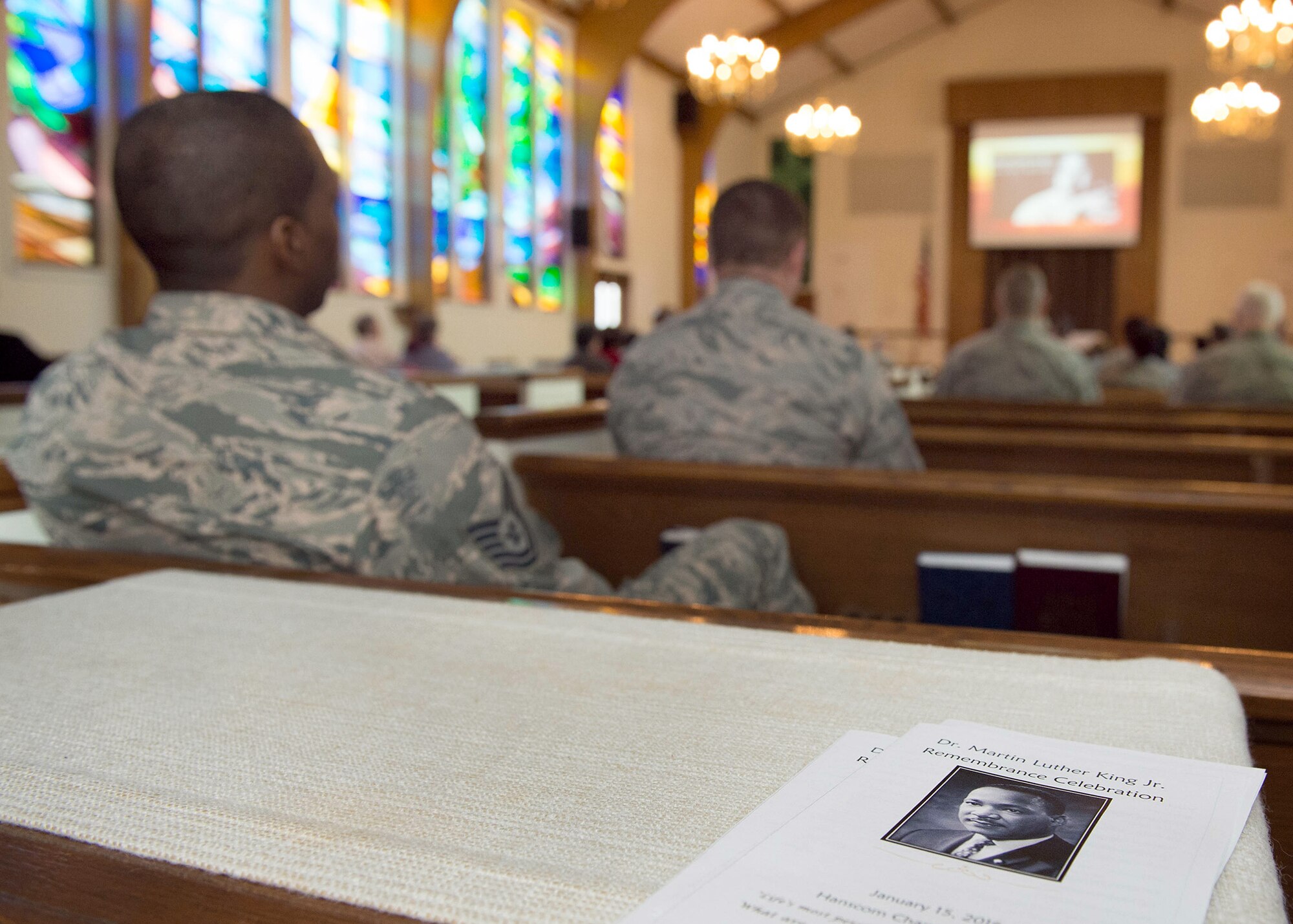 Members of the Hanscom community attend a Dr. Martin Luther King, Jr. remembrance observance at the base chapel Jan. 15. The theme for this year's observance once again was: Remember! Celebrate! Act! A Day On, Not a Day Off! Organizers encouraged members of the community to take time to remember and act Jan. 18 while celebrating Dr. King during the federal holiday. (U.S. Air Force photo by Jerry Saslav)