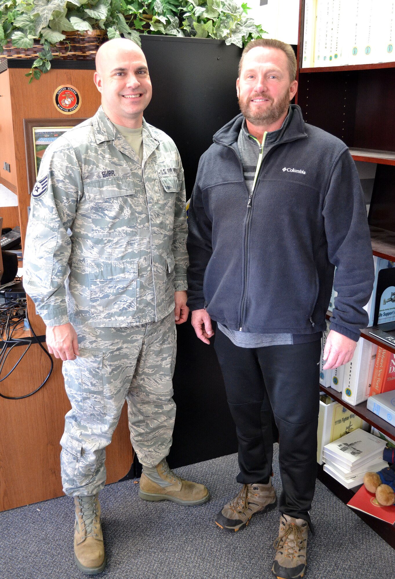 Staff Sgt. Scott Burr, left, safety and occupational health monitor with the 111th Attack Wing at the Horsham Air Guard Station, Pennsylvania meets with retired 111th ATKW Lt. Col. Scott Hreso on Jan. 6, 2016 here. Hreso, a former A-10 Thunderbolt II pilot and chief of safety, revisits his old office and celebrates his first full year of military retirement this week. (U.S. Air National Guard photo by Master Sgt. Christopher Botzum)