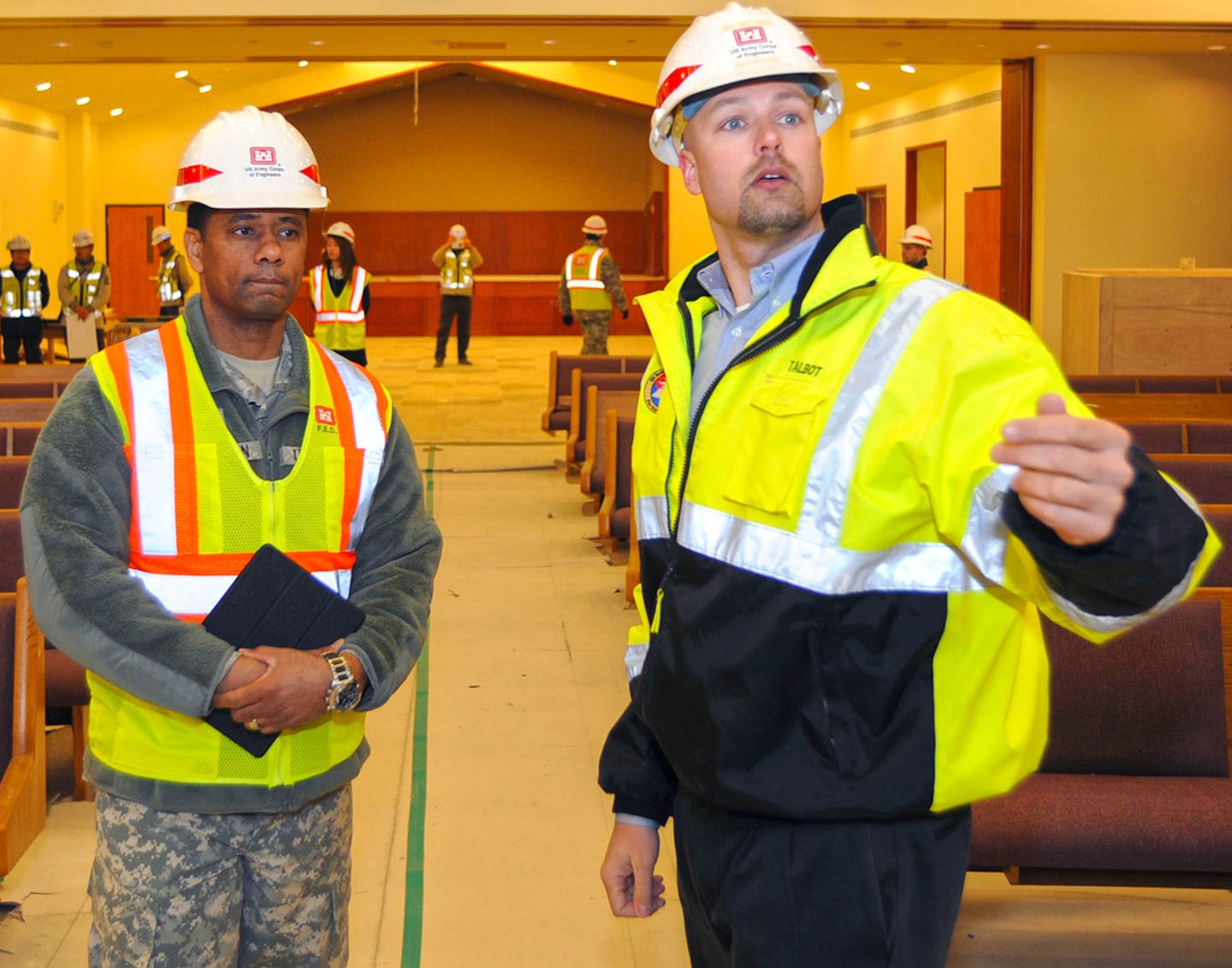 Chaplain (Col.) Raymond A. Robinson, Jr., the USFK command chaplain, tours the nearly completed chapel #1 with David M. Talbot, resident engineer of the Far East District's Family Housing Resident Office at Camp Humphreys.

One critical aspect of any military installation is a space that allows for service members to exercise their freedom of religion. For a military city, greater numbers and diversity demand more than just a single space. The first of four new chapels is slated to be put into use by mid-2016.

Until around 2014, U.S. Army Garrison-Humphreys personnel exercised their freedom of religion using one small chapel (the Freedom Chapel) and a small worship space in the 501st Military Intelligence area, said Robinson. Since the Freedom Chapel was demolished, the chaplains have been holding services in the Humphreys high school through a facility usage agreement with the Department of Defense Education Activity. 

“Many of us in the Far East District have been personally invested in the construction of these chapels, and we’re going to be just as excited as the rest of the Chapel community to see this and our other new chapels open up,” said Talbot.
