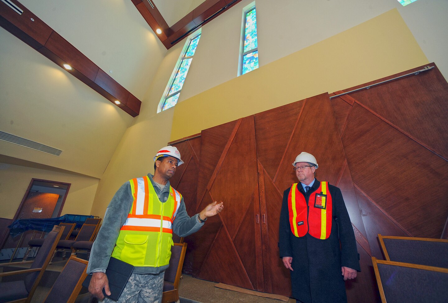 In this photo, Chaplain (Col.) Raymond A. Robinson, Jr., the USFK command chaplain, tours the new, nearly completed chapel #1 at Camp Humphreys.


One critical aspect of any military installation is a space that allows for service members to exercise their freedom of religion. For a military city, greater numbers and diversity demand more than just a single space. The first of four new chapels is slated to be put into use by mid-2016.

Until around 2014, U.S. Army Garrison-Humphreys personnel exercised their freedom of religion using one small chapel (the Freedom Chapel) and a small worship space in the 501st Military Intelligence area, said Robinson. Since the Freedom Chapel was demolished, the chaplains have been holding services in the Humphreys high school through a facility usage agreement with the Department of Defense Education Activity.
