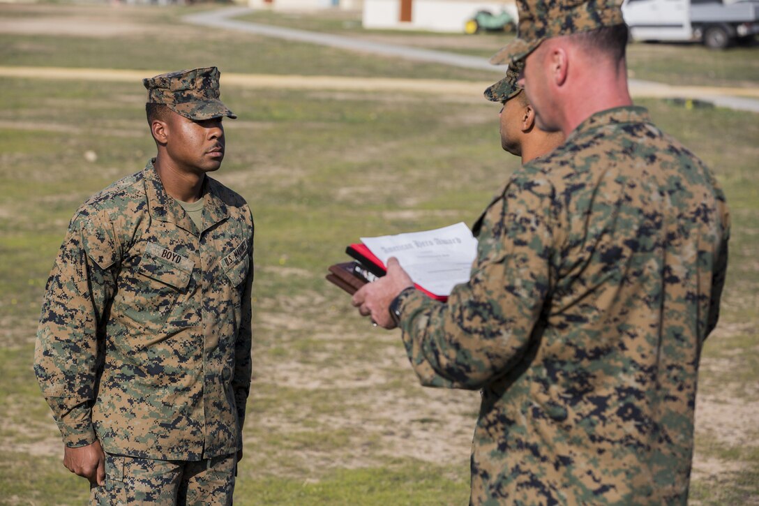 Sgt. Raheem Boyd, a heavy equipment operator with Special-Purpose Marine Air-Ground Task Force Crisis Response-Africa is recognized for his heroic actions during an American Hero Award ceremony aboard Morón Air Base, Spain, Dec. 23, 2015. Boyd’s courageous actions prevented a suicide aboard Camp Lejeune, May, 2015. (U.S. Marine Corps photo by Staff Sgt. Vitaliy Rusavskiy/Released)