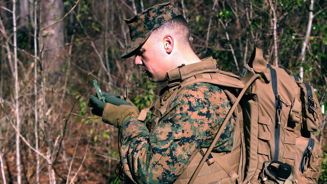 Lance Cpl. Joshua B. Gilmore sets his azimuth to the next point during a land navigation course at Marine Corps Air Station Cherry Point, N.C., Jan. 13, 2016. During the 19-point course, 20 Marines with Marine Wing Support Squadron 274’s Engineer Company, Heavy Equipment Platoon headed to the field to re-experience the basic land navigation process. The course was a refresher for most of the Marines, who have not used land navigation since Marine Combat Training. Gilmore is an engineer equipment operator with MWSS-274.