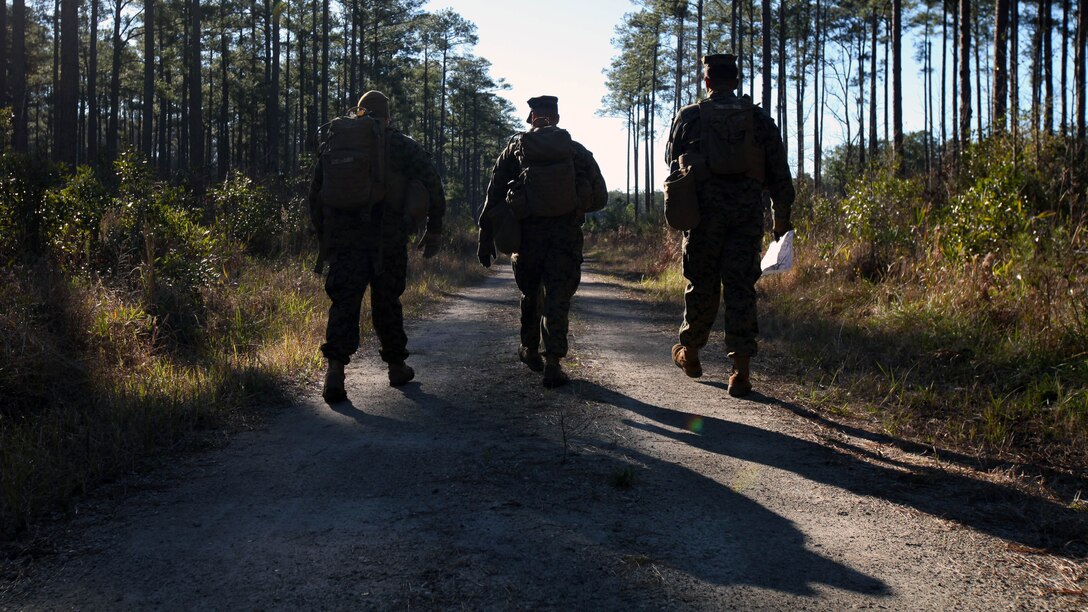 Marines with Marine Wing Support Squadron 274’s Engineer Company, Heavy Equipment Platoon head back to the starting point after completing a land navigation course at Marine Corps Air Station Cherry Point, N.C., Jan. 13, 2016. During the 19-point course, 20 Marines headed to the field to re-experience the basic land navigation process. The course was a refresher for most of the Marines, who have not used land navigation since Marine Combat Training. 