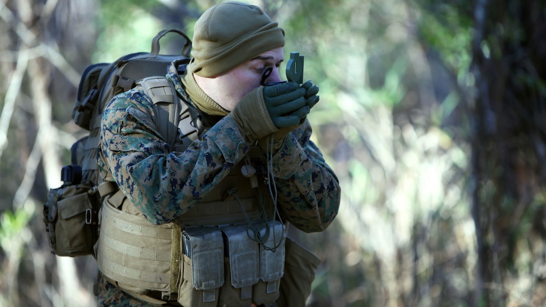 Lance Cpl. Joshua B. Gilmore sets his azimuth to the next point during a land navigation course at Marine Corps Air Station Cherry Point, N.C., Jan. 13, 2016. During the 19-point course, 20 Marines with Marine Wing Support Squadron 274’s Engineer Company, Heavy Equipment Platoon headed to the field to re-experience the basic land navigation process. The course was a refresher for most of the Marines, who have not used land navigation since Marine Combat Training. Gilmore is an engineer equipment operator with MWSS-274.