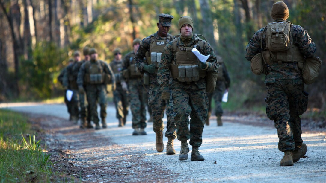 Marines with Marine Wing Support Squadron 274’s Engineer Company, Heavy Equipment Platoon set their pace count before beginning a land navigation course at Marine Corps Air Station Cherry Point, N.C., Jan. 13, 2016. During the 19-point course, 20 Marines headed to the field to re-experience the basic land navigation process. The course was a refresher for most of the Marines, who have not used land navigation since Marine Combat Training. 