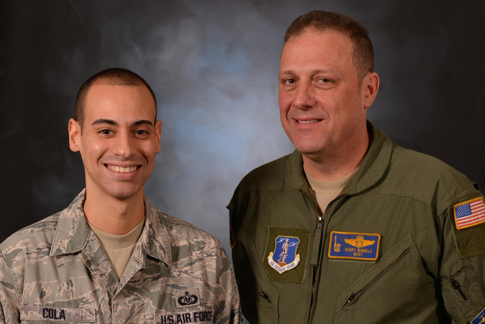 New York Air National Guard Staff Sgt. Daniel Cola, left, and Master Sgt. Henry Windels pose for a photo at Stewart Air National Guard Base, near Newburgh, New York, Dec. 23, 2015. Windels donated a kidney to Cola Oct. 6, 2015. Both men are members of the New York Air National Guard's 105th Airlift Wing.  
