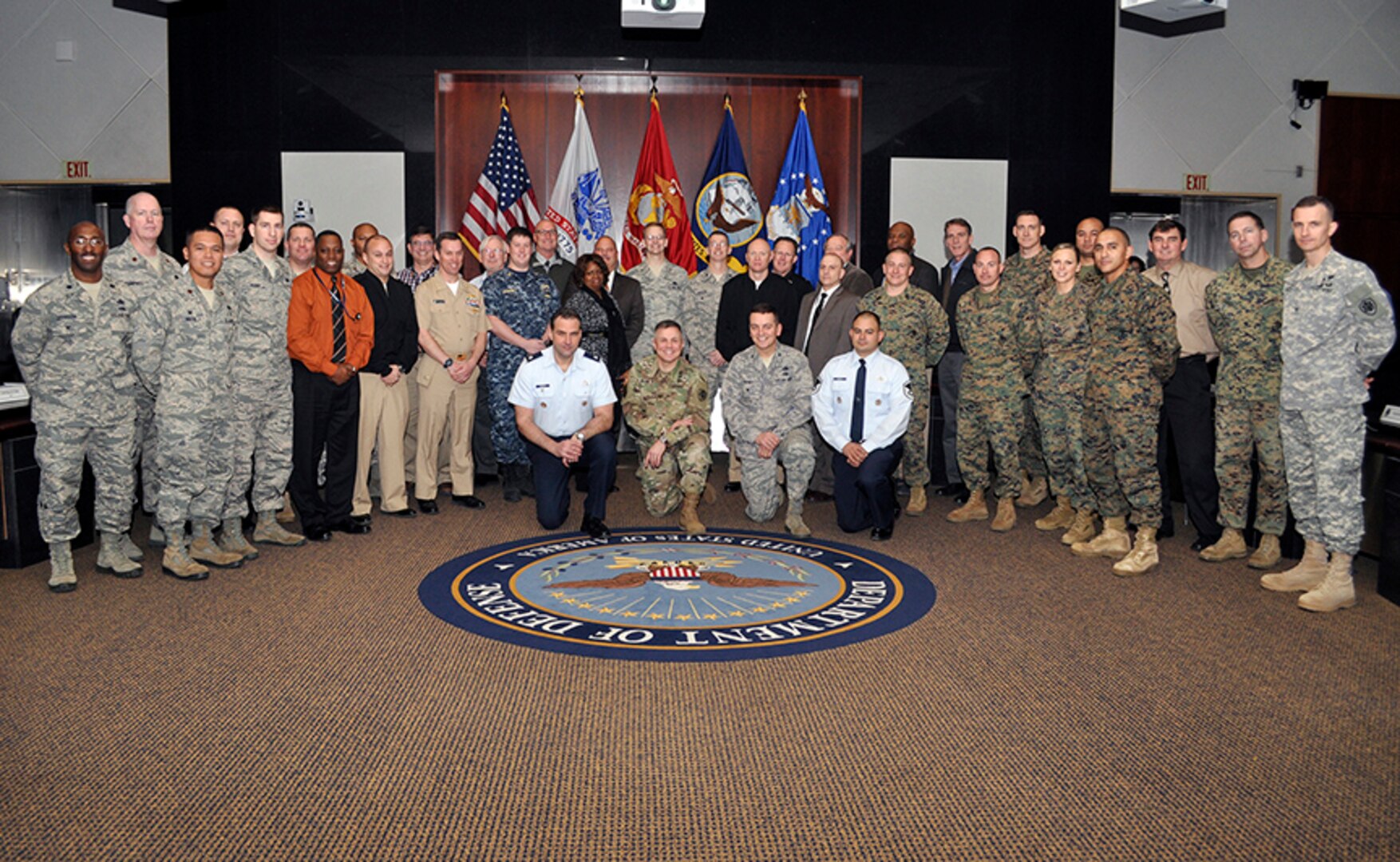 Air Force Brig. Gen. Mark McLeod, Defense Logistics Agency Energy commander, poses for a group photo with attendees of the 15th annual Joint Petroleum Seminar at the McNamara Headquarters Complex at Fort Belvoir, Virginia, Jan. 13.