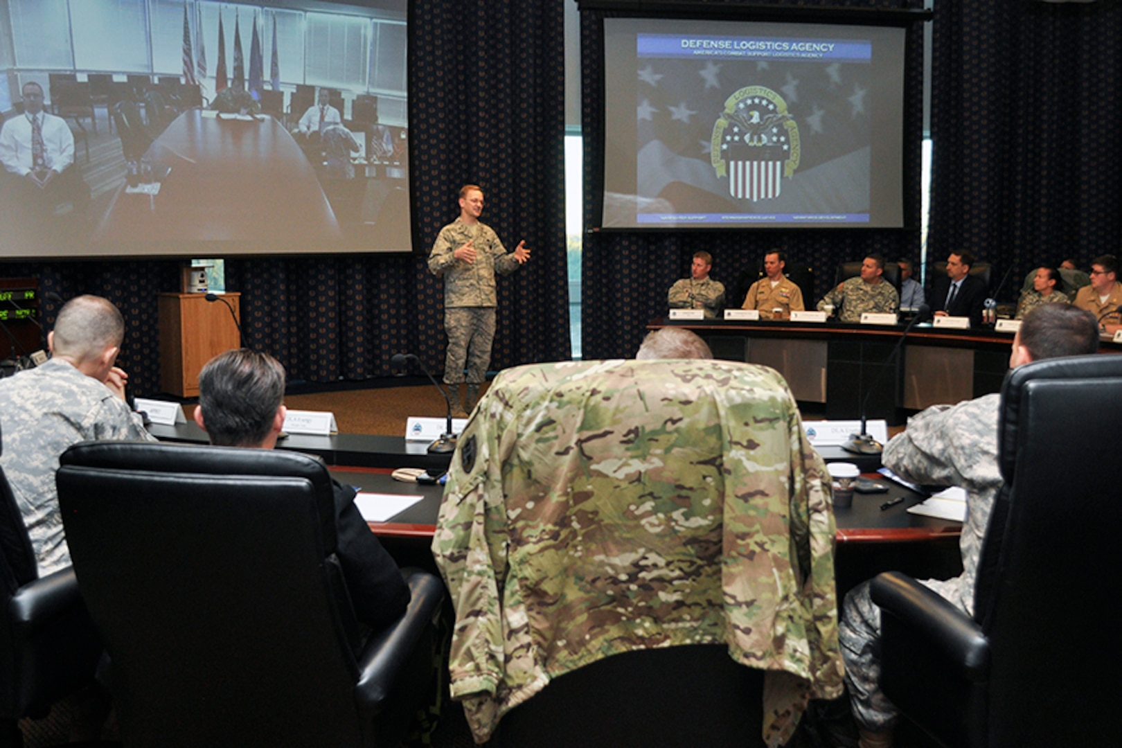 Air Force Brig. Gen. Mark McLeod, Defense Logistics Agency Energy commander, addresses the audience during his opening remarks at the 15th annual Joint Petroleum Seminar at the McNamara Headquarters Complex at Fort Belvoir, Virginia, Jan. 11.