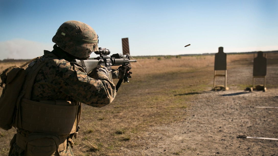 Cpl. Albert Willis, a combat engineer with Headquarters Company, 2nd Combat Engineer Battalion, fires at a target during a Combat Marksmanship Program qualification. Completed annually, this training helps Marines hone in on their skills as riflemen. The CMP shoot allows Marines to gain operate in simulated close-combat engagements which increase speed and accuracy. 