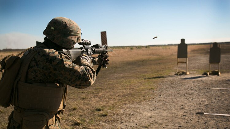 Cpl. Albert Willis, a combat engineer with Headquarters Company, 2nd Combat Engineer Battalion, fires at a target during a Combat Marksmanship Program qualification. Completed annually, this training helps Marines hone in on their skills as riflemen. The CMP shoot allows Marines to gain operate in simulated close-combat engagements which increase speed and accuracy. 