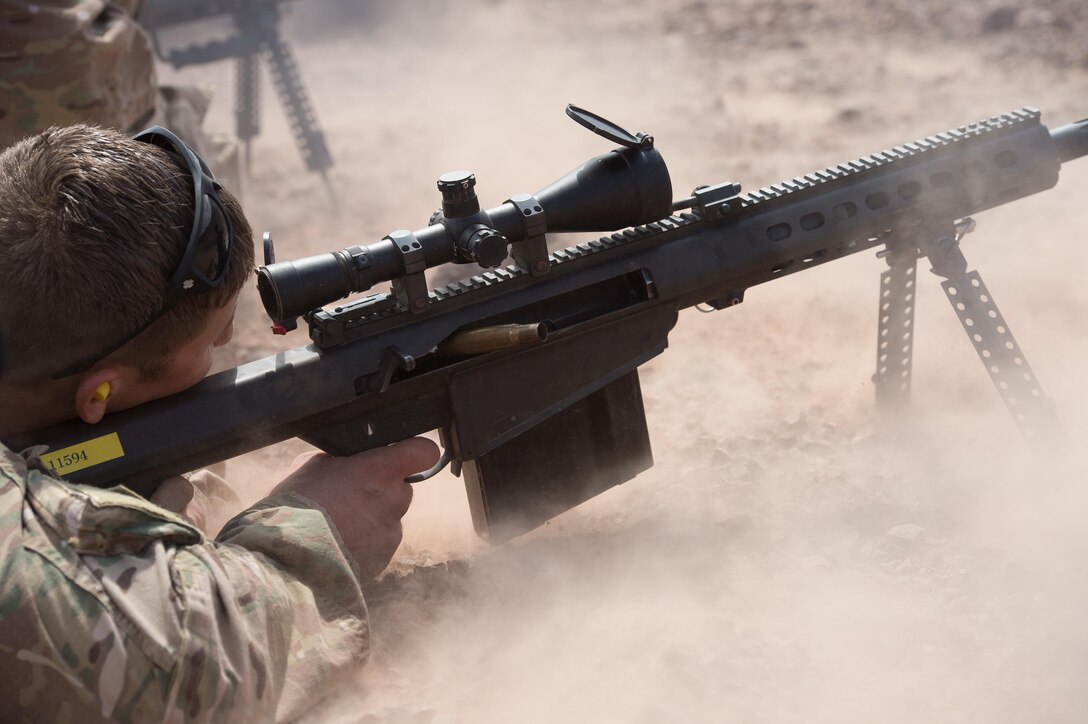 A U.S. soldier fires an M107 .50-caliber Special Applications Scoped Rifle during long-range marksmanship training in Djibouti, Jan. 9, 2016. U.S. Air Force photo by Tech. Sgt. Barry Loo