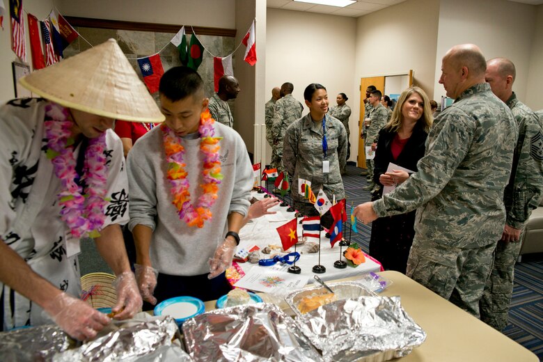 Attendees at the Team Little Rock Diversity Day 2016 celebration enjoy free food and cultural performances at Little Rock Air Force Base, Ark., Jan. 15, 2016. The U.S. Air Force broadly defines diversity as a composite of individual characteristics, experiences, and abilities consistent with the Air Force Core Values and the Air Force Mission. Air Force diversity includes, but is not limited to: personal life experiences, geographic background, socioeconomic background, cultural knowledge, educational background, work background, language abilities, physical abilities, philosophical/spiritual perspectives, age, race, ethnicity, and gender. (U.S. Air Force photo by Master Sgt. Jeff Walston/Released)
