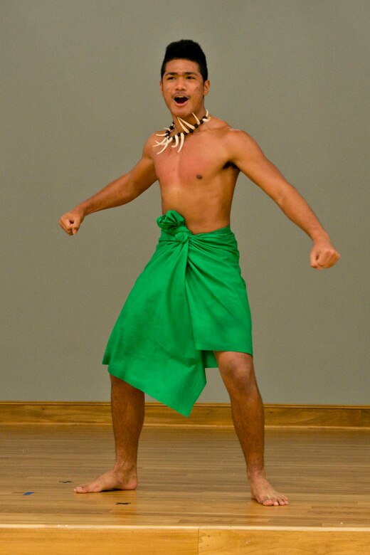 Faautuga Autele, from Fort Sill, Okla., performs a short Samoan version of a warrior dance or challenge called HAKA during the Team Little Rock Diversity Day 2016 celebration at Little Rock Air Force Base, Ark., Jan. 15, 2016. The HAKA originated from the Māori people of New Zealand, and is traditionally used on the battlefield, as well as when groups came together in peace. (U.S. Air Force photo by Master Sgt. Jeff Walston/Released)