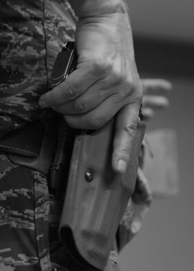 Air Force commanders can take additional measures to secure personnel and property on their installations through the Unit Marshal and Security Forces Staff Arming programs along with the Law Enforcement Officer Safety Act allow service members to carry weapons. (U.S. Air Force courtesy photo)