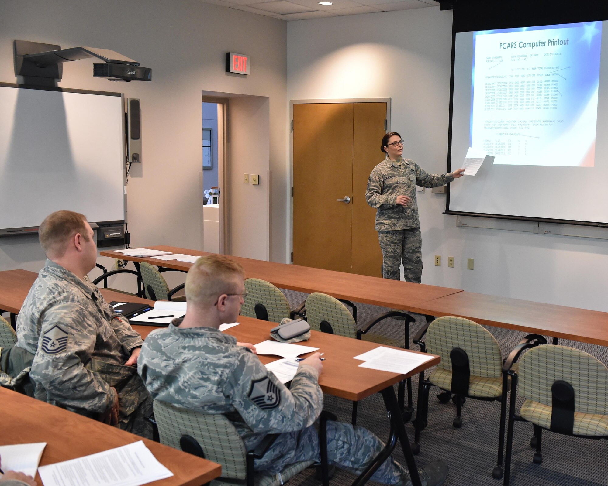 Chief Master Sgt. Jennifer McKendree, superintendent of the Military Personnel Section with the 910th Force Support Squadron, gives a presentation during the 2nd Annual MPS Open House here, Jan. 20, 2016. The event provides information to service members ranging from effective Enlistment Performance Report (EPR) writing to proper career management. (U.S. Air Force photo/Tech. Sgt. James Brock)