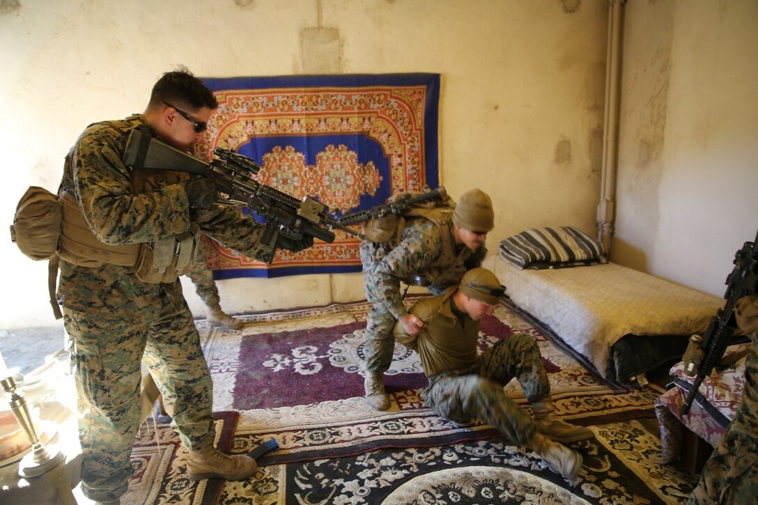 Marines and Sailors practice clearing rooms and detaining non-combatants as a part of the Raid Leaders Course at Marine Corps Base Camp Pendleton, Calif., Jan. 12, 2016. While the course emphasizes combat marksmanship fundamentals, Marines must be able to identify and properly handle non-combatants in urban military operations. The Marines participating in the training course are with Fox Company, 2nd Battalion, 4th Marine Corps Regiment. The Raid Leaders Course is run by Expeditionary Operations Training Group, I Marine Headquarters Group, I Marine Expeditionary Force.