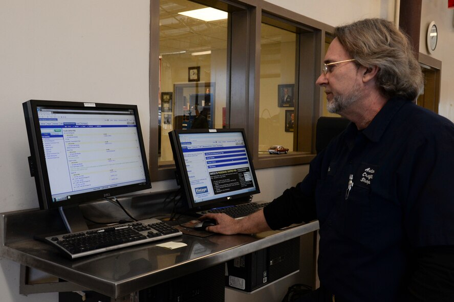 Tom Hunnicutt, 2nd Force Support Squadron automotive mechanic, pulls up vehicle information for an oil change at the Auto Hobby Center, Barksdale Air Force Base, La., Jan. 13, 2016. Two computer stations with the latest diagnostic reference materials are available to customers of the center for do-it-yourself automotive repairs. (U.S. Air Force photo by Senior Airman Amanda Morris)