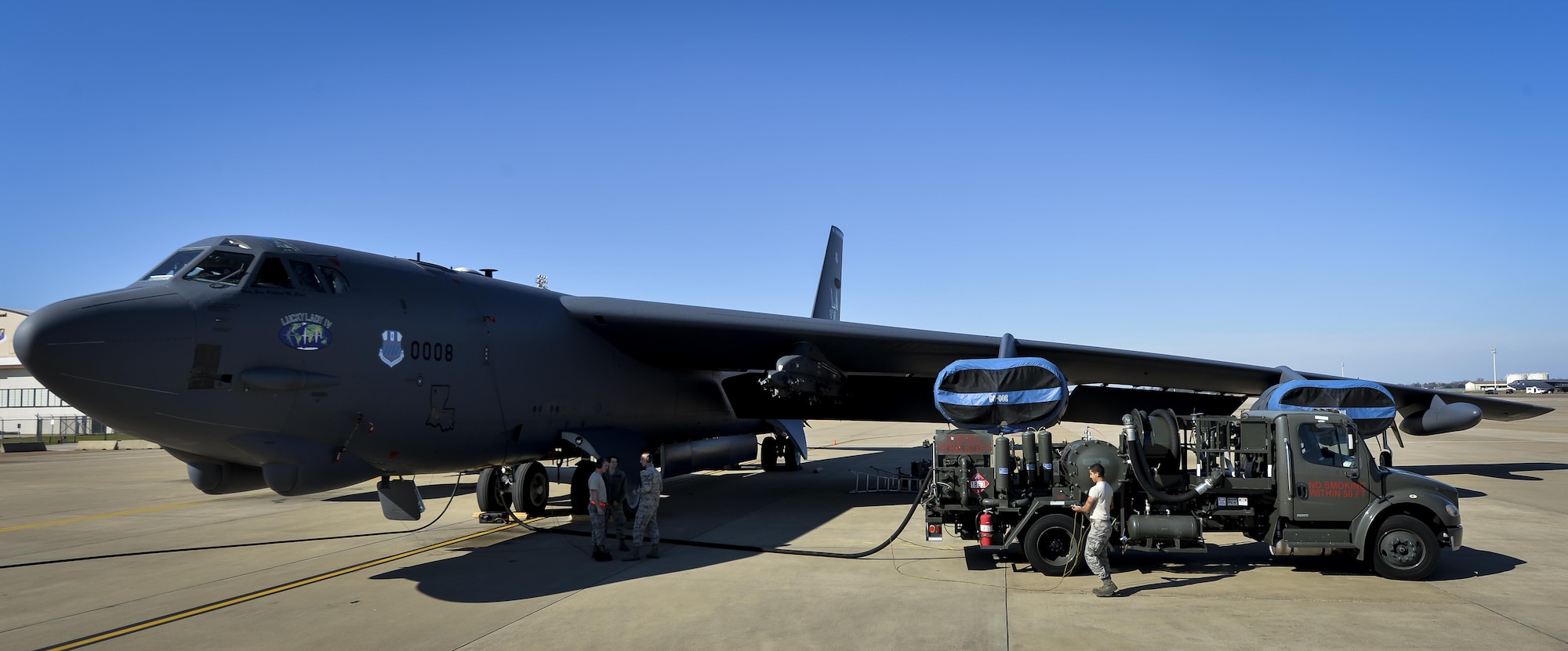 Airmen assigned to the 2nd Logistics Readiness Squadron petroleum, oils and lubricants distribution flight fuel a B-52 Stratofortress at Barksdale Air Force Base, La., Jan. 12, 2016. The distribution flight uses 22 vehicles to move an average of 600,000 gallons of fuel per week. (U.S. Air Force photo/Airman 1st Class Mozer O. Da Cunha)

