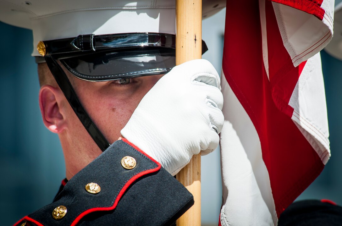 Sgt. Caleb Sims, with the Marine Corps Base Quantico Ceremonial Platoon Color Guard, presents arms during the opening ceremony of the Healthy Lifestyle Expo at the Fredericksburg Expo and Conference Center, May 16, 2014.