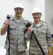 Col. Stephen Kravitsky, 90th Missile Wing commander, and Col. Hans Ritschard, 90th Medical Group commander, pose with safety gear and sledgehammers prior to a wall-breaking ceremony in the 90th MDG Medical Treatment Facility Jan. 19, 2015, on F.E. Warren Air Force Base, Wyo. The ceremony brought Airmen and community partners together to celebrate the upcoming construction project, which will rearrange the MTF’s layout. (U.S. Air Force photo by Airman 1st Class Malcolm Mayfield)