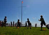 Children participate in a water balloon fight during Beach Fest on Joint Base Pearl Harbor-Hickam, Hawaii, Jan. 16, 2016. Beach Fest, a joint event held by MWR and Armed Forces Entertainment brought games and entertainment together with a live concert. (U.S. Air Force photo by Tech. Sgt. Aaron Oelrich/Released)   