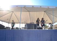 The Band Magic! performs during Beach Fest on Joint Base Pearl Harbor-Hickam, Hawaii, Jan. 16, 2016. Beach Fest, a joint event held by MWR and Armed Forces Entertainment brought games and entertainment together with a live concert. (U.S. Air Force photo by Tech. Sgt. Aaron Oelrich/Released)   