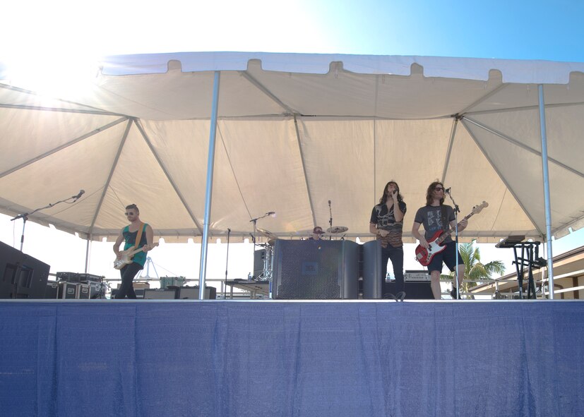 The Band Magic! performs during Beach Fest on Joint Base Pearl Harbor-Hickam, Hawaii, Jan. 16, 2016. Beach Fest, a joint event held by MWR and Armed Forces Entertainment brought games and entertainment together with a live concert. (U.S. Air Force photo by Tech. Sgt. Aaron Oelrich/Released)   
