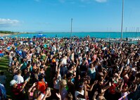 Military members and their family watch the band Magic! perform during Beach Fest on Joint Base Pearl Harbor-Hickam, Hawaii, Jan. 16, 2016. Beach Fest, a joint event held by MWR and Armed Forces Entertainment brought games and entertainment together with a live concert. (U.S. Air Force photo by Tech. Sgt. Aaron Oelrich/Released)   