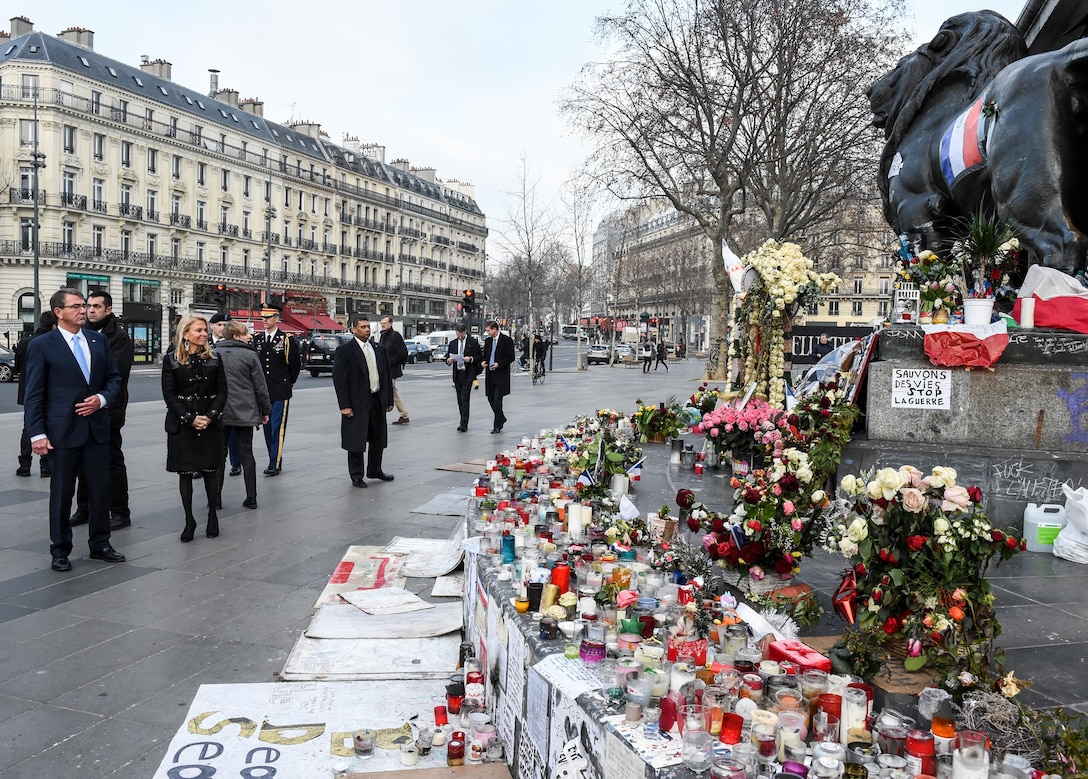 U.S. Defense Secretary Ash Carter, left, and U.S. Ambassador to France Jane D. Hartley view the memorial at Place de La Republique in Paris, Jan. 20, 2016, before they place a wreath to honor the victims of the November attacks in the city. DoD photo by Army Sgt. 1st Class Clydell Kinchen