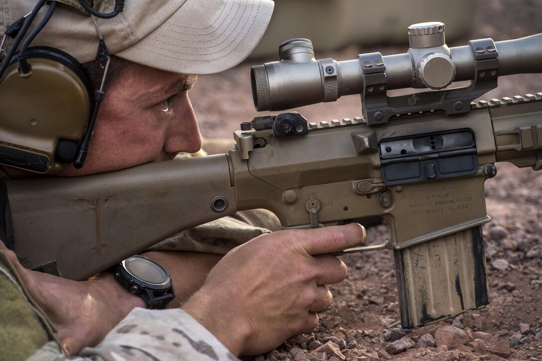 A U.S. airman fires an M110 semi-automatic sniper weapon during long-range marksmanship training in Djibouti, Jan. 9, 2016. The airman is assigned to Combined Joint Task Force Horn of Africa. U.S. Air Force photo by Tech. Sgt. Barry Loo