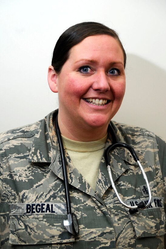 Staff Sgt. Christina Begeal, a 22nd Medical Group aerospace medical technician, poses for a photo, Jan. 13, 2016, at McConnell Air Force Base, Kan. Begeal saved the life of an individual at a local restaurant who suffered a seizure during his work shift. (U.S. Air Force photo/Airman Jenna K. Caldwell)