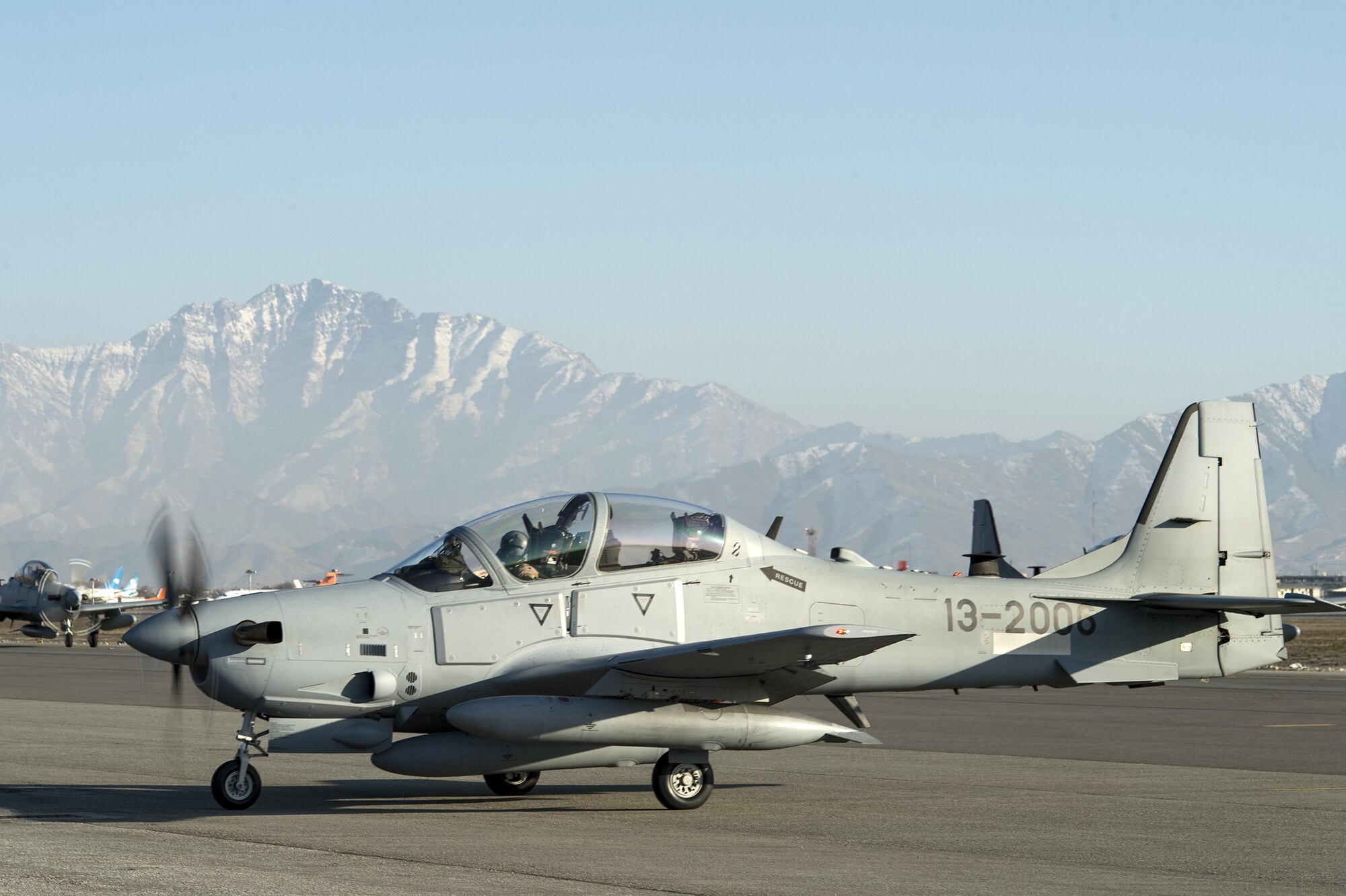 An A-29 Super Tucano taxis across the airfield at Hamid Karzai International Airport, Afghanistan, Jan. 15, 2016. The aircraft will be added to the Afghans' inventory in the spring of 2016. The A-29 Super Tucano is a 'light air support' aircraft capable of conducting close air support, aerial escort, armed overwatch and aerial interdiction. Designed to operate in high temperature and in extremely rugged terrain, the A-29 Super Tucano is highly maneuverable 4th generation weapons system capable of delivering precision guided munitions. It can fly at low speeds and low altitudes, is easy to fly, and provides exceptionally accurate weapons delivery. It is currently in service with 10 different air forces around the world. (U.S. Air Force photo by Tech. Sgt. Nathan Lipscomb) 