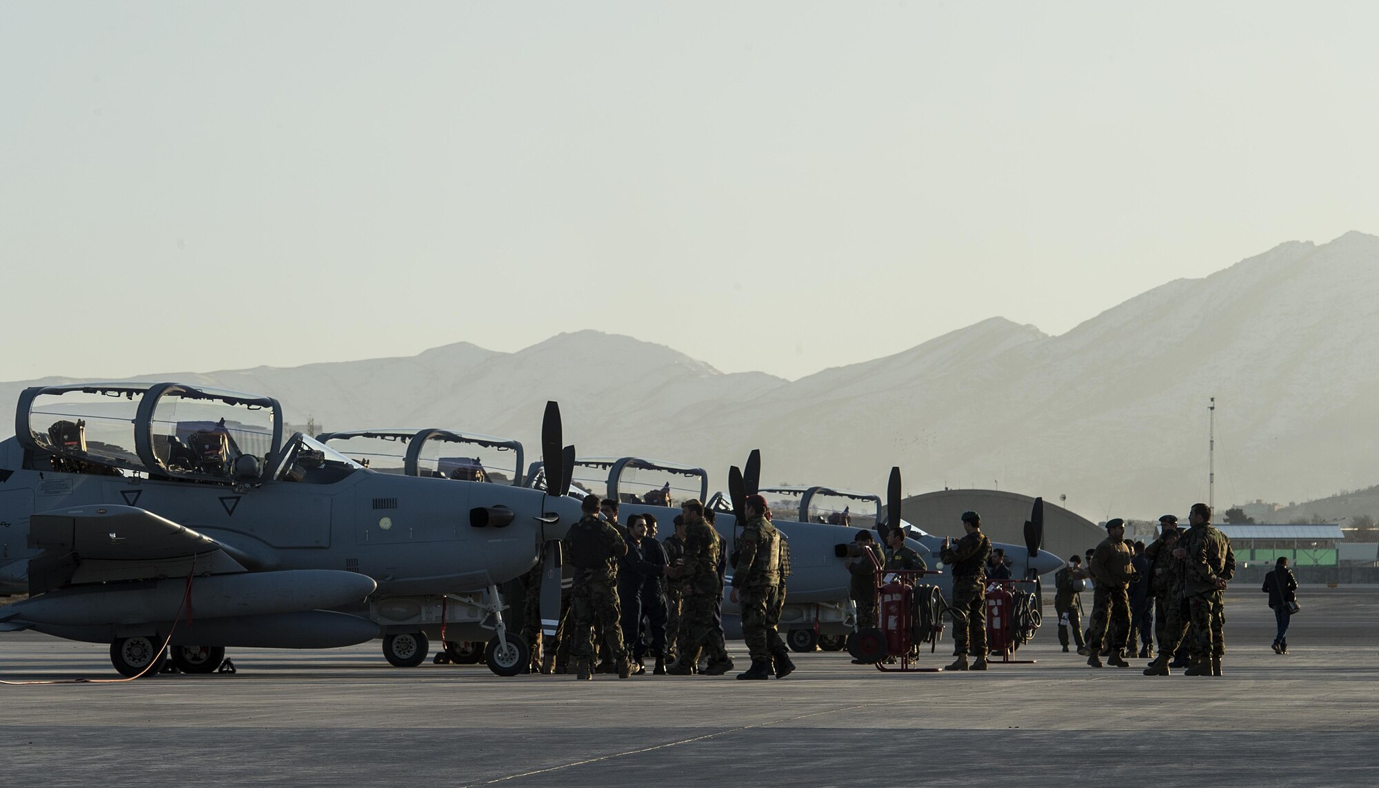 Four A-29 Super Tucanos arrive at Hamid Karzai International Airport, Afghanistan, Jan. 15, 2016. The aircraft will be added to the Afghans' inventory in the spring of 2016. The A-29 Super Tucano is a 'light air support' aircraft capable of conducting close air support, aerial escort, armed overwatch and aerial interdiction. Designed to operate in high temperature and in extremely rugged terrain, the A-29 Super Tucano is highly maneuverable 4th generation weapons system capable of delivering precision guided munitions. It can fly at low speeds and low altitudes, is easy to fly, and provides exceptionally accurate weapons delivery. It is currently in service with 10 different air forces around the world. (U.S. Air Force photo by Tech. Sgt. Nathan Lipscomb) 