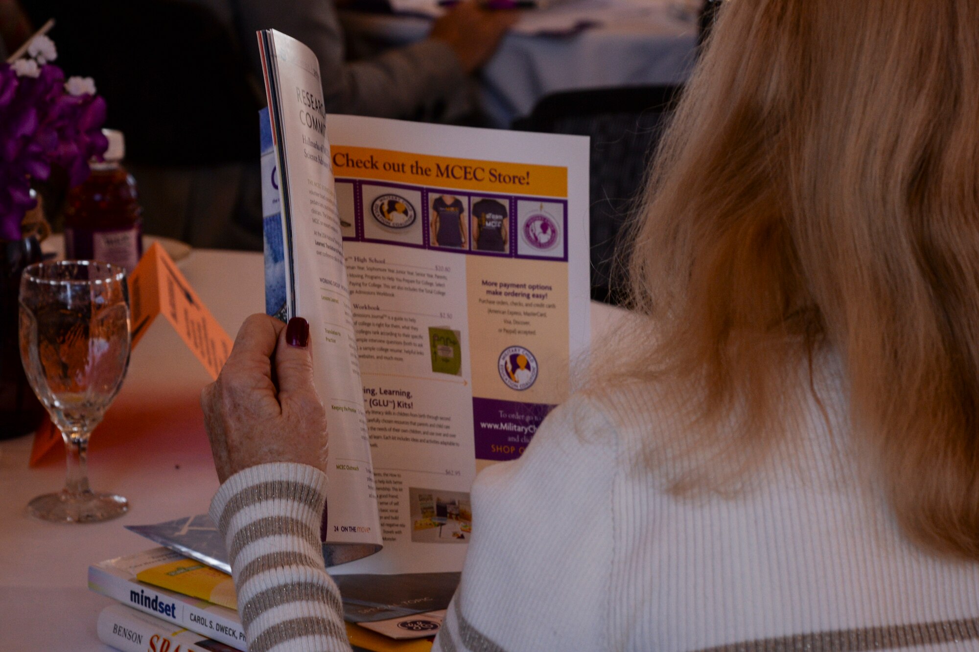 A participant looks through a booklet during a Military Child Education Coalition sponsored training class, Jan. 20, 2016, at Moody Air Force Base, Ga. Facilitators provided literature for participants to explore during the class and to take home. (U.S. Air Force photo by Airman 1st Class Janiqua P. Robinson/Released)